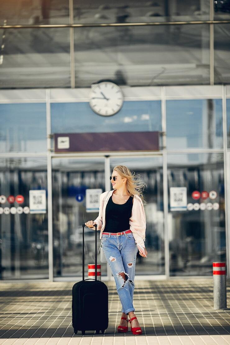 beautiful-girl-standing-airport_1157-22049